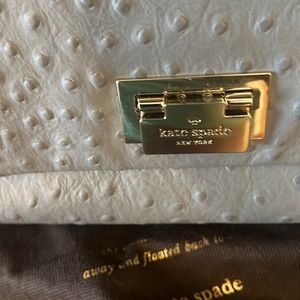 Preloved Kate Spade Gray Pebble Leather handbag with silver accessories